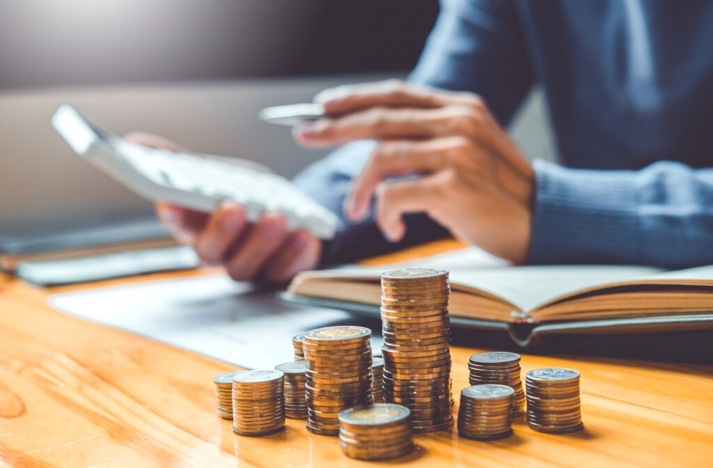 Saving money concept Man hand putting Row and coin Write Finance Saving money concept Man hand putting Row and coin Write Finance