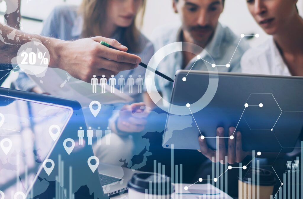 Concept of digital diagram,graph interfaces,virtual screen,connections icon on blurred background.Coworking team meeting